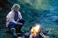 kvinna vid l�gereld